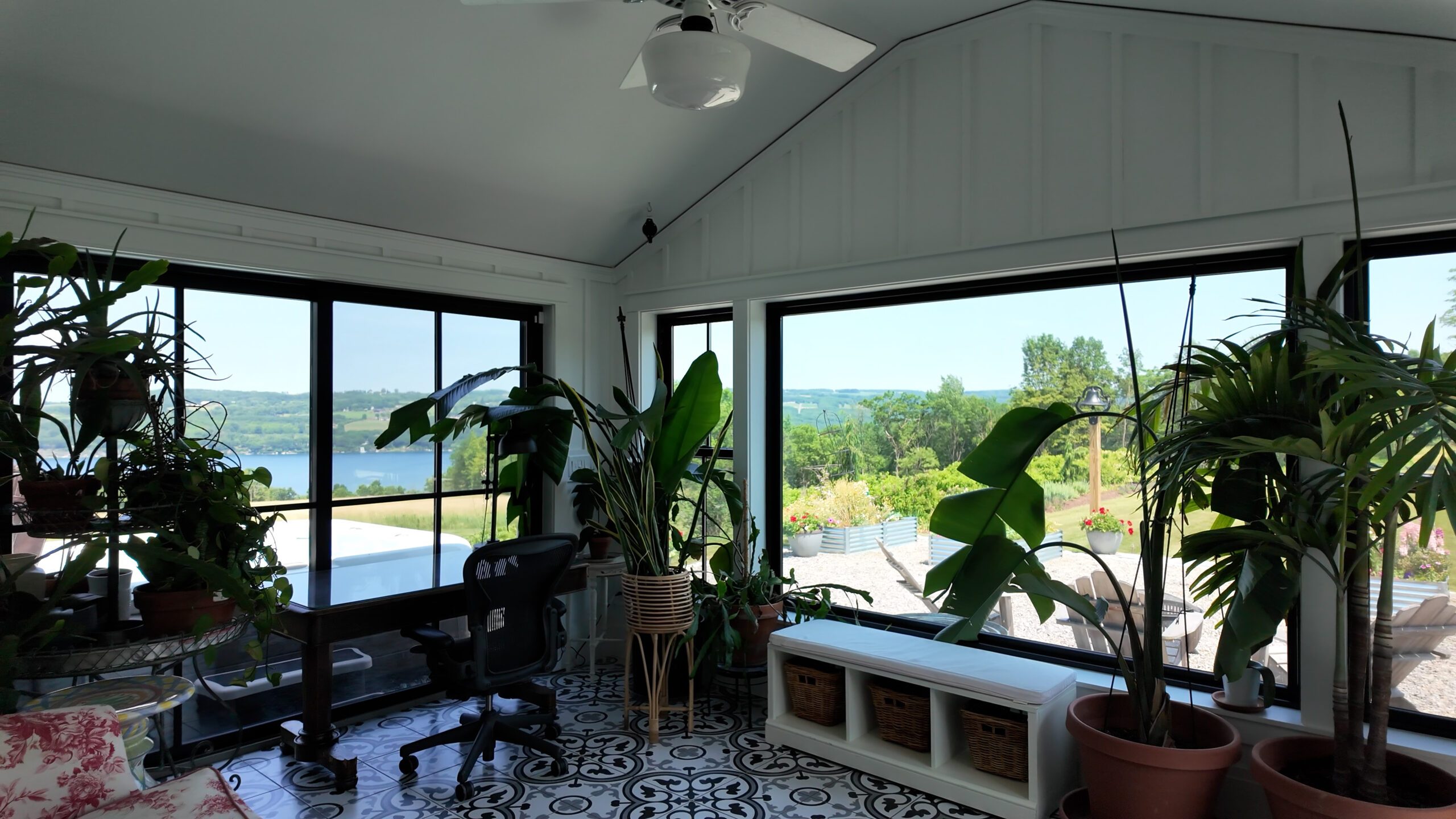 Light-filled sunroom with views toward Skaneateles Lake